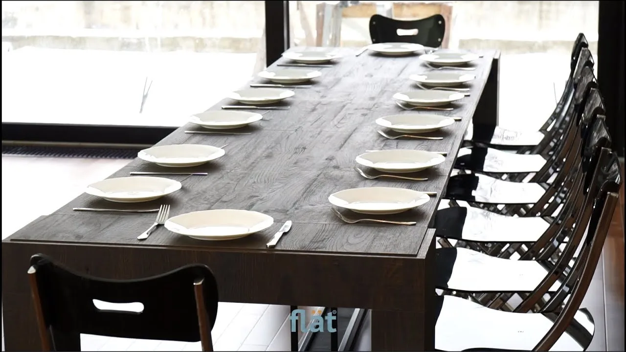 An extending table set for 12, from the assembly film